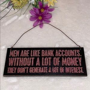 Wooden quoted plaque.